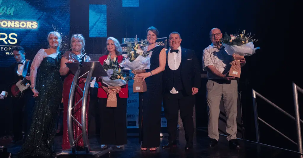 Wigan Business Awards Headline Sponsors Vanliners on Stage with the Organisers
