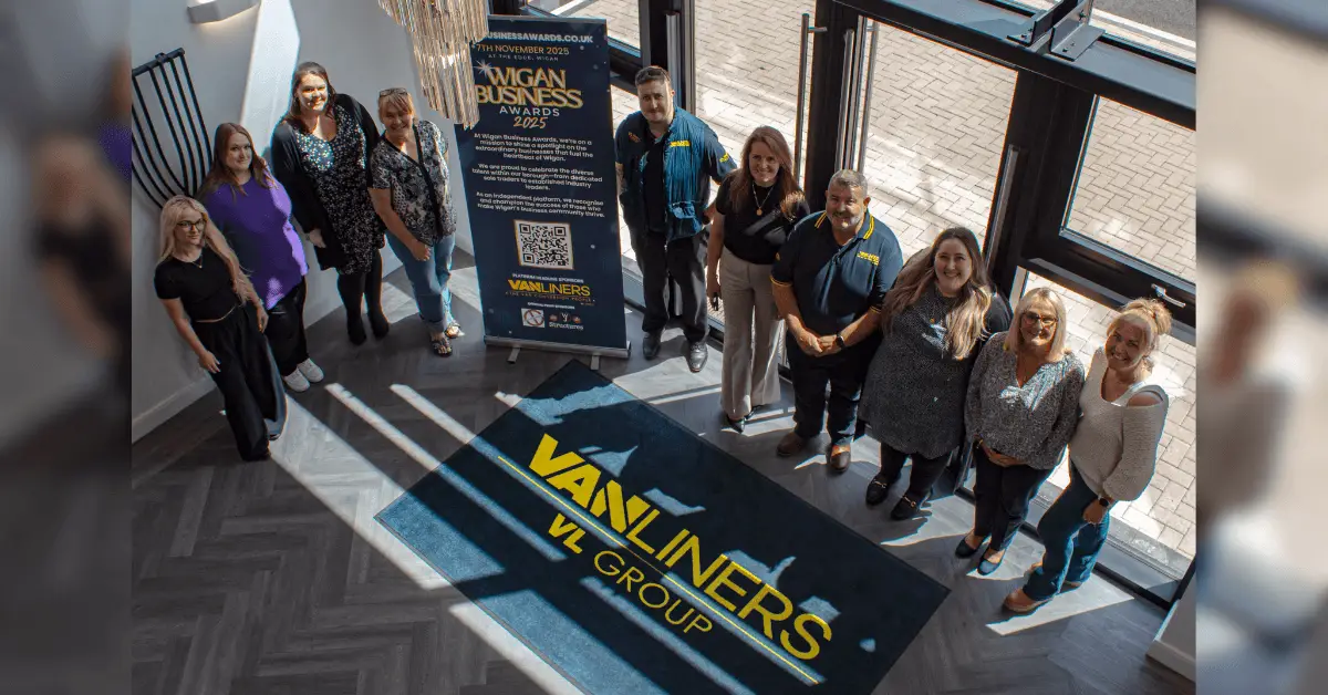 The organisers of Wigan Business Awards with platinum sponsors Vanliners in the foyer of their building