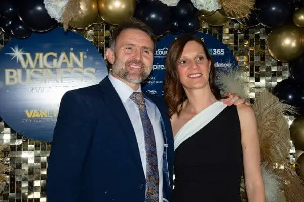 Image shows David Radley and Elizabeth Radley Smiling at Wigan Business Awards 2024