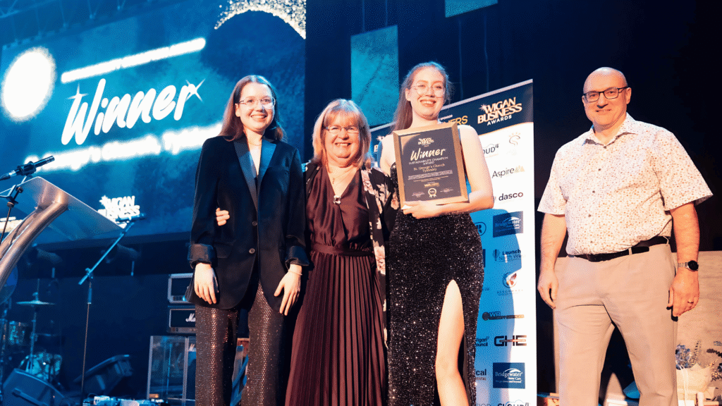 Amy Hodcroft, Susie Mallon, Bethany Hodcroft from Tyldesley St. Georges Winners of Sustainability Champion 2024 with Phil Paramore Plan It ESG - Category Sponsor