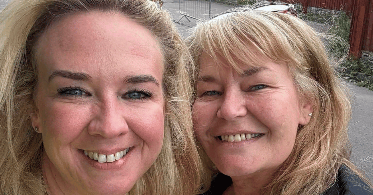 Two smiling women posing for a selfie outdoors at the Wigan Business Awards, celebrating their involvement in the local business community.